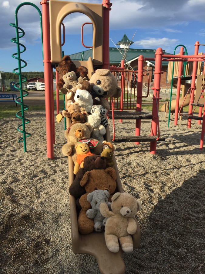 East Glacier Bear school bears on slide